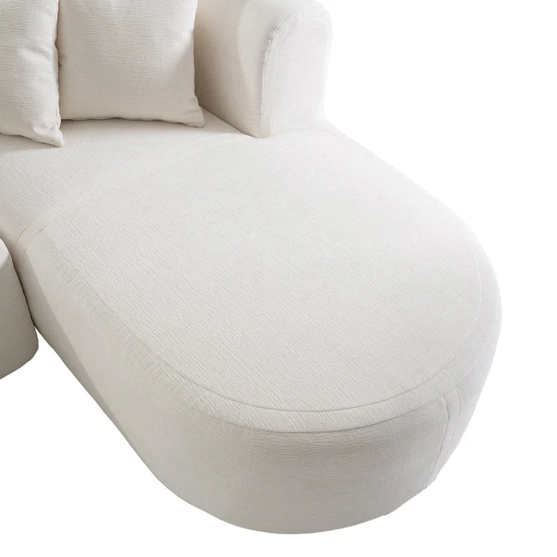 Canapé d'angle quatre places en polyester au design incurvé et surpiqûres larges.