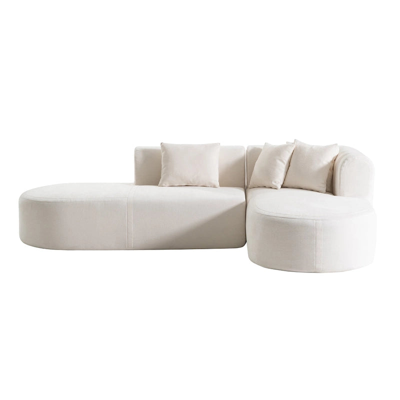 Canapé d'angle quatre places en polyester au design incurvé et surpiqûres larges.