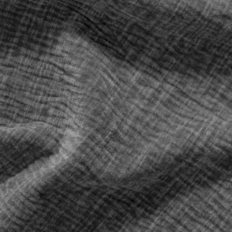 Canapé d'angle quatre places en polyester au design incurvé et surpiqûres larges.