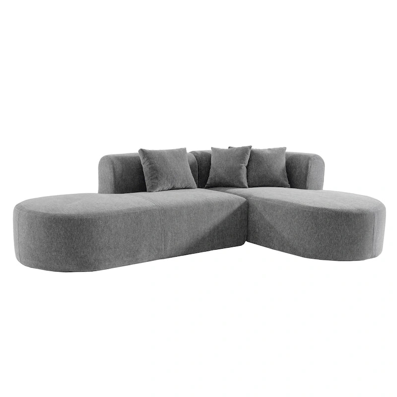 Canapé d'angle quatre places en polyester au design incurvé et surpiqûres larges.