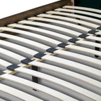 Lit en tissu beige capitonné